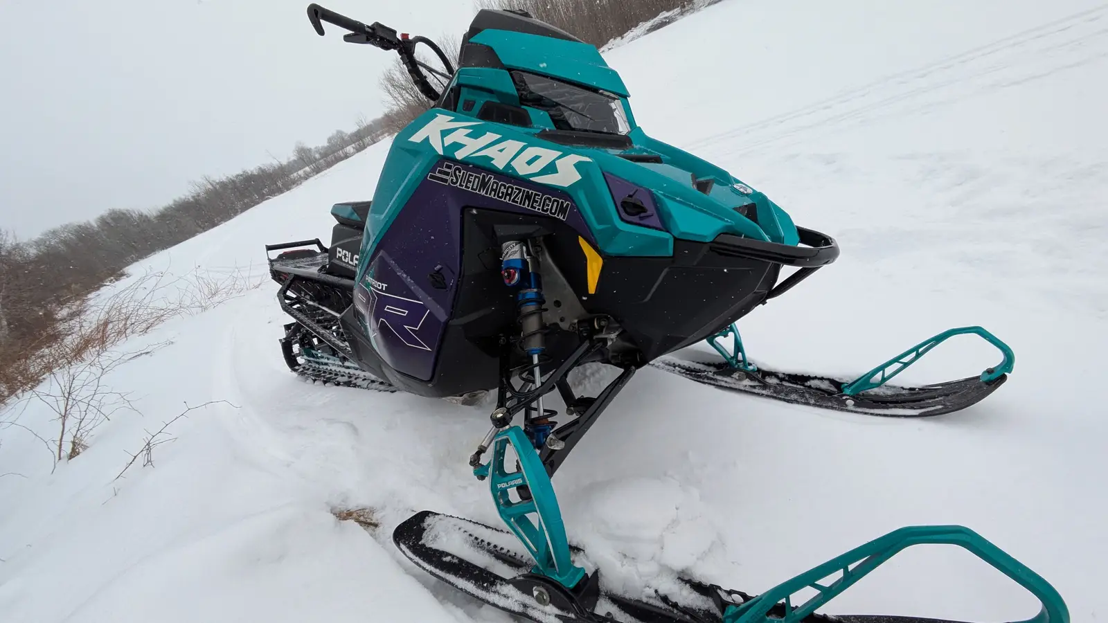 Full Review of the Polaris Patriot 9R RMK Khaos Slash 155: a Powerful, Agile Mountain Snowmobile… But Demanding